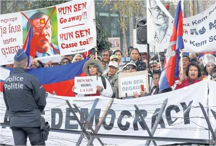  ?? REUTERS ?? Protesters chant slogans against Cambodia’s Prime Minister Hun Sen during the EU-Asia leaders’ summit in Belgium in October 2018.