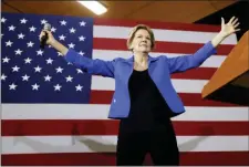  ?? CHARLIE NEIBERGALL — THE ASSOCIATED PRESS FILE ?? In this photo, Democratic presidenti­al candidate Sen. Elizabeth Warren, D-Mass., speaks to students and staff at Roosevelt High School in Des Moines, Iowa.