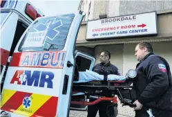  ?? PHOTO: REUTERS ?? Hospitals inundated . . . Officers load a bed into an ambulance outside the Brookdale Hospital Medical Centre during the Covid19 outbreak in New York City.