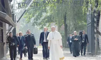  ??  ?? PONTIFF VISITS AUSCHWITZ Pope Francis leaves the former Nazi death camp of Auschwitz, in Oswiecim, on 29 July. He visits the Auschwitz-Birkenau WWII- era Nazi German death camp, where he will pray with Poland’s chief Rabbi Michael Schudrich for its 1.1...
