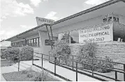  ?? [PHOTO BY BRYAN TERRY, THE OKLAHOMAN] ?? Parkside Optical and Dr. Brad Fielding received a Citation of Merit from the State Historic Preservati­on Office for renovation of what originally was Parkside Osteopathi­c Hospital at 318 S Littler Ave., Edmond, which dates to 1950.