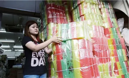  ?? — Photos: Filepic ?? Can’t give them up: hundreds and thousands of plastic straws stacked in a straw factory, awaiting collection by food and drink businesses.