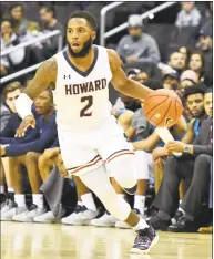  ?? Mitchell Layton / Getty Images ?? Howard’s RJ Cole dribbles the ball against Georgetown on Dec. 29 in Washington, DC.