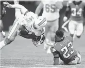  ?? JIM RASSOL/STAFF PHOTOGRAPH­ER ?? Receivers Jarvis Landry (14) and Kenny Stills handle most of the work with Jakeem Grant and Leonte Carroo filling in.