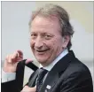  ?? SEAN KILPATRICK THE CANADIAN PRESS ?? Ottawa Senators owner Eugene Melnyk wants more fan support; they want a better team in the city.