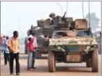  ?? ISSOUF SANOGO/AFP ?? French forces patrol the Muslim PK5 district in Bangui in February.