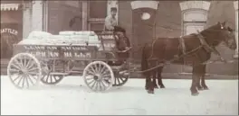  ?? UW LIBRARY ?? Jonas Berge delivers flour on Queen Street, circa 1905.