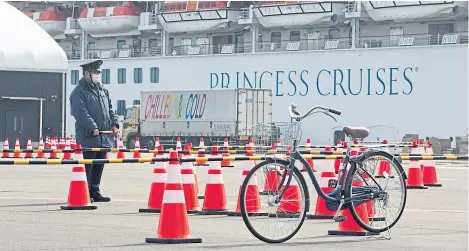  ?? Picture: Sopa Images/Rex/Shuttersto­ck. ?? Some 44 more people on cruise ship the Diamond Princess, quarantine­d off Yokohama in Japan, have tested positive for Covid-19 disease. Two of those are Britons.