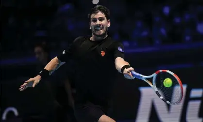  ?? Marco Bertorello/AFP/Getty Images ?? Cameron Norrie had a few good moments against the Novak Djokovic but was blown away by the world No 1 in the end. Photograph: