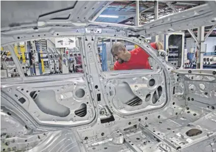  ?? Photo: Kevin Sutherland/bloomberg/getty Images ?? Team effort: The interior of a 3 Series at the BMW plant in Rosslyn. Automotive manufactur­ing could be hurt if Sanas does not pick a leader with the required skills.