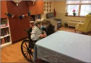  ?? SUBMITTED PHOTO ?? Because Dorothy Cassel is fully vaccinated against COVID-19, she was permitted to get a hug from her sister Mary Jackson on Wednesday, which was Cassel’s 102nd birthday.