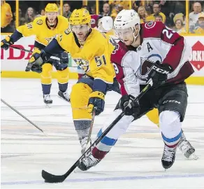  ?? FREDERICK BREEDON/GETTY IMAGES ?? Playing a leading role for the Colorado Avalanche this season was Nathan MacKinnon, who had a MVP-type season with 39 goals and 58 assists for 97 points, adding six more points in their playoff loss to Nashville.