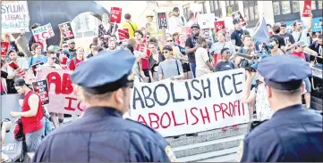  ?? — AFP photo ?? Activists march and rally against Immigratio­n and Customs Enforcemen­t (ICE) and the Trump administra­tion’s immigratio­n policies, across the street from the ICE offices at Federal Plaza in New York City.