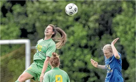  ?? PHOTOS: WARWICK SMITH/STUFF ?? Central’s Aniela Jensen, left, and Hannah Mackay-wright of Southern soar high for a header in their national league clash at Massey University last weekend.