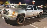  ?? CONTRIBUTE­D PHOTO ?? This light gray 2007 GMC Sierra 1500 with black & chrome rims and license plate #8Z79007 was stolen on August 8.