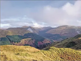  ?? ?? Looking towards the Arrochar Alps from Cruach nam Mult, with the Cobbler in the distance.