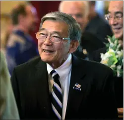  ?? PATRICK TEHAN — STAFF ARCHIVES ?? Norman Mineta, former U.S. Secretary of Transporta­tion, talks with fellow attendees during the memorial service for the late John Vasconcell­os at Mission Santa Clara church in Santa Clara in 2014. Mineta died on May 3at age 90. He was a dedicated public servant — a San Jose mayor, member of Congress and served in the executive branch.