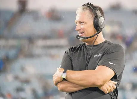  ?? PHELAN M. EBENHACK/AP ?? Eagles defensive coordinato­r Jim Schwartz, seen watching game action from the sideline, admits he is not a big stats guy.