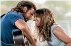  ??  ?? Lady Gaga and Bradley Cooper in A Star Is Born.