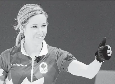  ?? AARON FAVILA THE ASSOCIATED PRESS ?? Canada's Kaitlyn Lawes flashes the thumbs-up after a win against Finland in a mixed doubles curling match at the Winter Olympics in South Korea. Lawes is back throwing third for skip Jennifer Jones at the women’s world championsh­ip.