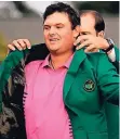  ?? FOTO: AP ?? Pinkes Shirt unter dem grünen Masters-Jacket: Patrick Reed.