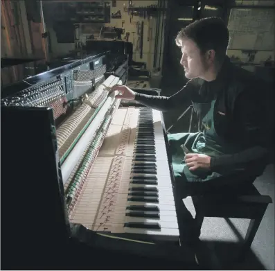  ?? PICTURES: LORNE CAMPBELL/GUZELIAN ?? NOTEWORTHY: Main, Adam Connolly, of Cavendish Pianos, works on one of the around 50 instrument­s the firm makes every year; left, his colleague Mike Derrett does the same. Cavendish Pianos is the last commercial manufactur­er of traditiona­l pianos in Britain.