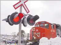  ?? CP PHOTO ?? A CN locomotive moves in the railway yard in Dartmouth, N. S. on Feb. 23, 2015. The potential dismantlin­g of the North American Free Trade Agreement poses the biggest risk to Canada’s railways not benefiting this year from healthy economies and higher...