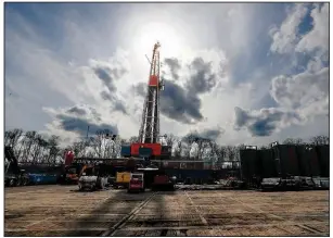  ?? (AP) ?? President Donald Trump’s administra­tion rolled back Obama-era rules designed to limit greenhouse gas emissions from pipelines, and oil and gas fields like this shale gas drilling site in St. Mary’s, Pa.