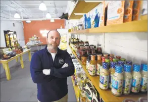  ?? Matthew Brown / Hearst Connecticu­t Media ?? Chef Mike Geller, founder of Mike’s Organic Delivery, on Friday at his store in Stamford. In a response to the COVID-19 crisis, Geller has uploaded an offering of healthy pantry tips to his company's website.