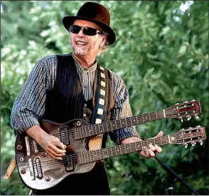  ?? Democrat-gazette file photo ?? Bluesman Roy Rogers, who was named for the singing cowboy, plays the King Biscuit Blues Festival’s Main Stage on Thursday night. He will be joined by special guest Sonny Landreth.