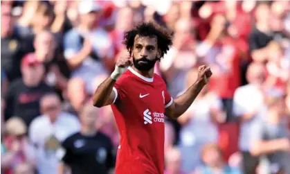  ?? Andrew Powell/Liverpool FC/Getty Images ?? Mohamed Salah did not appear distracted by the transfer saga as he was involved in all three goals against Aston Villa. Photograph: