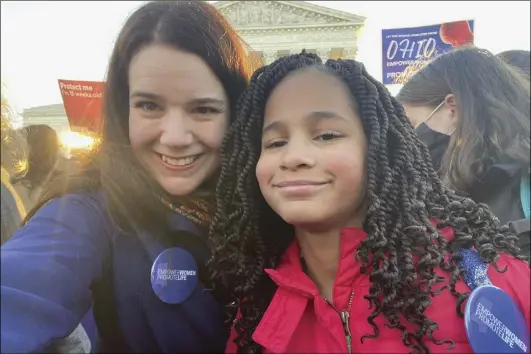  ?? Photo by Mary Elizabeth Coleman ?? Missouri state Rep. Mary Elizabeth Coleman traveled with her daughter, Larkin, to hear arguments in Dobbs v. Jackson Women’s Health Organizati­on.