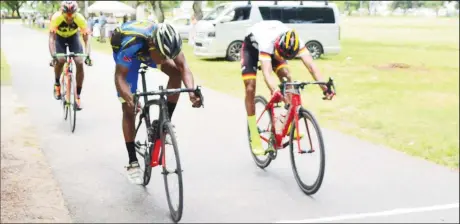  ??  ?? Andre ‘Padlock’ Green betters Paul DeNobrega by a half a wheel to take the spoils of the Star Party Rental criterium programme yesterday at the National Park. Trailing a close third is Jamal John.