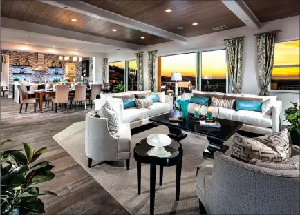  ??  ?? Tour the exclusive Toll Brothers’ communitie­s in El Dorado Hills, where six luxury models capture vistas of Folsom Lake, the Sierra foothills and city lights.