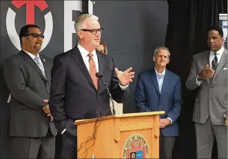  ?? STAFF ?? Taylor Communicat­ions President Mark O’Leary speaks at the company’s downtown office grand opening in 2017.