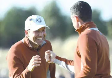  ?? — AFP photo ?? Sergio Garcia and Rory McIlroy got Europe off to a flying start in Saturday’s morning fourballs.