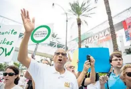  ?? YUTAO CHEN/STAFF PHOTOGRAPH­ER ?? Fort Lauderdale resident Darryl Harris chants at the rally outside the Diplomat Beach Resort in Hollywood, part of a movement to force change in U.S. immigratio­n policy.