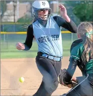  ?? MEDIANEWS GROUP FILE PHOTO ?? Pennridge’s Liv Campbell waits for the ball as North Penn’s Erin Maher runs for home plate.