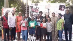  ??  ?? Programme Chair, Committee of Relevant Art (CORA), Mr. Jahman Anikulapo (left); some of the chidren guests at the Green Festival; Green Queen, Sola Alamutu, and Mr. Chuma Nwokolo (extreme right)