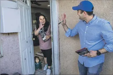  ?? Mel Melcon Los Angeles Times ?? MATT JACOBS, a Republican candidate in California’s 26th Congressio­nal District, waves goodbye after speaking with Jacqueline Mercado, 28, an Oxnard Democrat who said she would vote for him Tuesday.