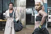  ?? MPAA rating: MERRICK MORTON/WARNER BROS. PICTURES ?? Viola Davis, left, and Cynthia Erivo appear in the riveting Chicago-set heist thriller “Widows.”