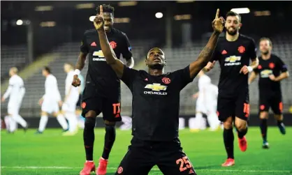  ??  ?? Odion Ighalo celebrates after scoring against Lask in the Europa League. Photograph: Christian Bruna/EPA