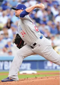  ??  ?? The Dodgers tried to get into the “psyche” of Cubs starter Jon Lester in Game 5 on Thursday.
| HARRY HOW/ GETTY IMAGES