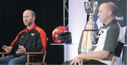  ??  ?? Calgary Stampeders head coach Dave Dickenson, left, and Ottawa Redblacks head coach Rick Campbell answer questions from the media Wednesday ahead of Sunday’s Grey Cup.