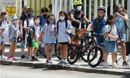  ?? Photograph:Larry Marano/Rex/Shuttersto­ck ?? Children leave Riverglade­s Elementary School in Broward county, Florida, this week.