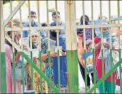  ?? AJAY AGGARWAL/HT PHOTO ?? A queue outside a public distributi­on shop. n