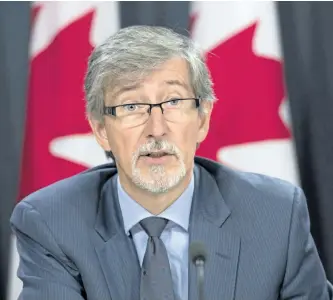  ?? ADRIAN WYLD/CANADIAN PRESS ?? Privacy commission­er Daniel Therrien is seen during a press conference after tabling his latest annual report.