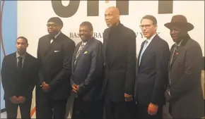  ?? Doug Feinberg / Associated Press ?? New York basketball stars, from left, Andre Barrett, Sam Perkins, Bernard King, Kareem Abdul-Jabbar, Kiki VanDeWeghe and Felipe Lopez celebrate the opening of an exhibit to honor the history of the game in the Big Apple.