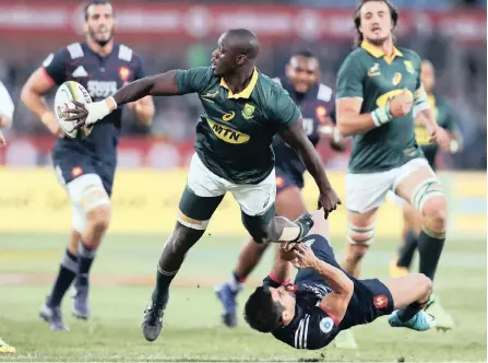  ?? PICTURE: BACKPAGEPI­X ?? ONE WING TO ‘RHULE’ THEM ALL: Raymond Rhule got a chance to stretch his legs in his Test debut against France this past weekend due to the new attackmind­ed approach of the Springboks.