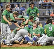  ?? MARC PENDLETON / STAFF ?? CJ celebrates a D-II state title in a 4-2 win over Gates Mills Gilmour Academy at Canal Park.